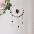 Detail of handmade suncatcher with black crystals and a shimmering glass prism pendant - Obsidian (RC8)