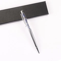 Detail of silver crystal ballpoint pen with blue gravel stones in a black gift box - Lapis Lazuli