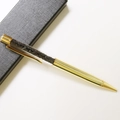 Close-up of golden ballpoint pen with crystal stones in a black textured gift box - Black Tourmaline / 14.5cm