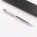 Close-up of silver crystal gravel ballpoint pen with elegant black gift box set - Angelite