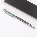 Silver ballpoint pen with green crystal stone fragments inside and a black gift box - Malachite