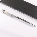 Close-up of silver metal crystal pen with colorful crushed stones and black gift box - Colorful Fluorite