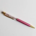 Detail of pink metal ballpoint pen with gold clip and purple crystal stones filling - Kunzite / 14cm Black Ink Refill