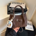 Dark brown matte tote bag with buckle detail and cute plush dog charm on books - No Pendant / Brown