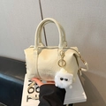 Chic cream Boston bag with pleated leather texture, fashion lettering and fur pom charm - No Pendant / White