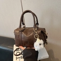 Dark brown Boston handbag in lychee grain leather with a white sheep plush pendant - No Pendant / Brown