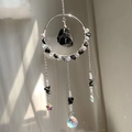 Rainbow suncatcher with black raw stone and multifaceted crystal prism in silver ring - Obsidian Style