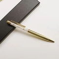 Luxury gold metal ballpoint pen with transparent barrel filled with white crystals - Blue Moonstone / 14.5cm
