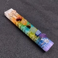 Close-up of rainbow chakra stones wrapped in copper wire on translucent selenite slab - Rainbow Electroplated (Multicolor) / 70-90mm
