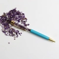 Blue ballpoint pen with transparent top filled with purple natural crystal crushed stones - Amethyst