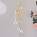 Detailed view of handmade moon suncatcher with yellow crystals and glass spheres - CD3 / Citrine Color