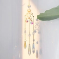Moon and star suncatcher with AB crystal balls and golden metal chain hanging by leaves - Star Moon Prism Style