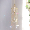 Golden suncatcher with crystal column and iridescent rainbow pendants in sunlight - Clear Quartz Point / 55cm
