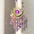 Detail of sun moon crystal suncatcher with amethyst beads creating rainbow light - 32cm / Purple