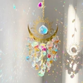 Close-up of golden sun and moon crystal suncatcher with rainbow light refraction - 32cm / Rainbow