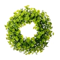 Lush green shamrock wreath for St. Patrick's Day door decoration on white background - Four-Leaf Clover Style