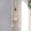 Golden suncatcher with octahedron frame, black raw stone, and crystal prisms - Obsidian / 55cm