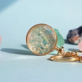 Portachiavi in cristallo dorato rotondo con pietre preziose naturali in ghiaia - Morganite