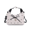 White quilted bow shoulder bag with black 'k' pattern and heart charm detail - White