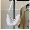Close-up of beige plaid shoulder bag featuring delicate bear embroidery and canvas strap - Standard / Off White