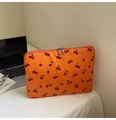 Detail of orange laptop sleeve with red cherry prints and dual metal zippers - Orange