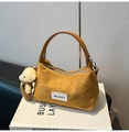 Detail of yellow corduroy handbag with brown leather handles and a cute teddy bear charm - With Pendant / Brown