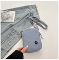 Elegant haze blue nylon crossbody bag with pleated texture and adjustable strap - Blue