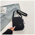 Compact black nylon crossbody bag with LYT logo and adjustable woven shoulder strap - Black