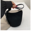 Chic black matte bucket bag for women with knotted strap and minimalist gold charm - Black