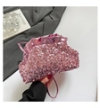 Pochette da sera con paillettes rosa e rifiniture a balze con tracolla a catena - Rosa