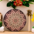 Bohemian shaman drum with pink mandala pattern and wooden mallet on wooden shelf - Mandala Style