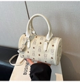Close-up of beige pillow bag with bear pattern and high-quality lychee texture leather - Basic Style / White
