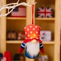Light-up Patriotic Gnome plush with red star hat and blue body for independence day - Top Hat Style