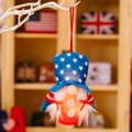 Patriotic gnome ornament with LED light, red knit body and blue star hat with hanging loop - Top Hat Female Style