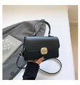 Elegant black minimalist square handbag with gold twist lock and adjustable shoulder strap - Black