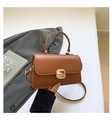 Caramel brown leather handbag with gold buckle and adjustable crossbody strap - Brown