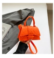 Chic vibrant orange felt handbag with diamond quilted stitching and long shoulder strap - Orange