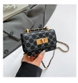 Detail of grey plaid mini bag with golden metal twist lock and chain strap - Black