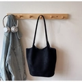 Large black faux suede tote bag with slim shoulder straps on a wooden wall hook - No Pendant / Black