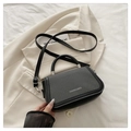 Chic black and dark grey mini crossbody bag with woven texture and top handle - Black