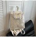 Zaino bianco in pelle sintetica con bordi a balze, texture a farfalla e fiocco - Bianco