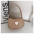 Detail of light brown crescent bag featuring heart-shaped rhinestone and golden bow decor - Dark Khaki