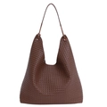 Dark brown woven hobo bag with intricate cross-weave texture and long shoulder strap - Coffee