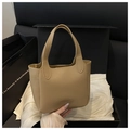 Close-up of khaki litchi grain leather tote bag in a premium black gift box set - No Pendant / Dark Khaki
