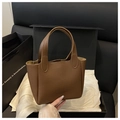 Detail of brown litchi pattern leather handbag on premium silk and black gift box - No Pendant / Brown