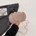 Pochette de soirée rose à texture melon avec fermoir nœud doré et chaîne métal - Rose