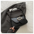 Elegant black faux leather shoulder bag with decorative large gold square buckle - Black