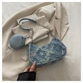 Detail of blue denim shoulder bag with star pattern, distressed edges and chain strap - Colorful Star