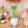 Handmade knitted Easter gnome with green hat, bunny ears and colorful spring flower bouquet - Green Knitted Gnome with Flower Bouquet / Green