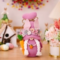 Purple Easter knitted gnome doll with bunny ears, flower crown and orange carrot - Purple Knitted Gnome with Carrot / Pink Purple